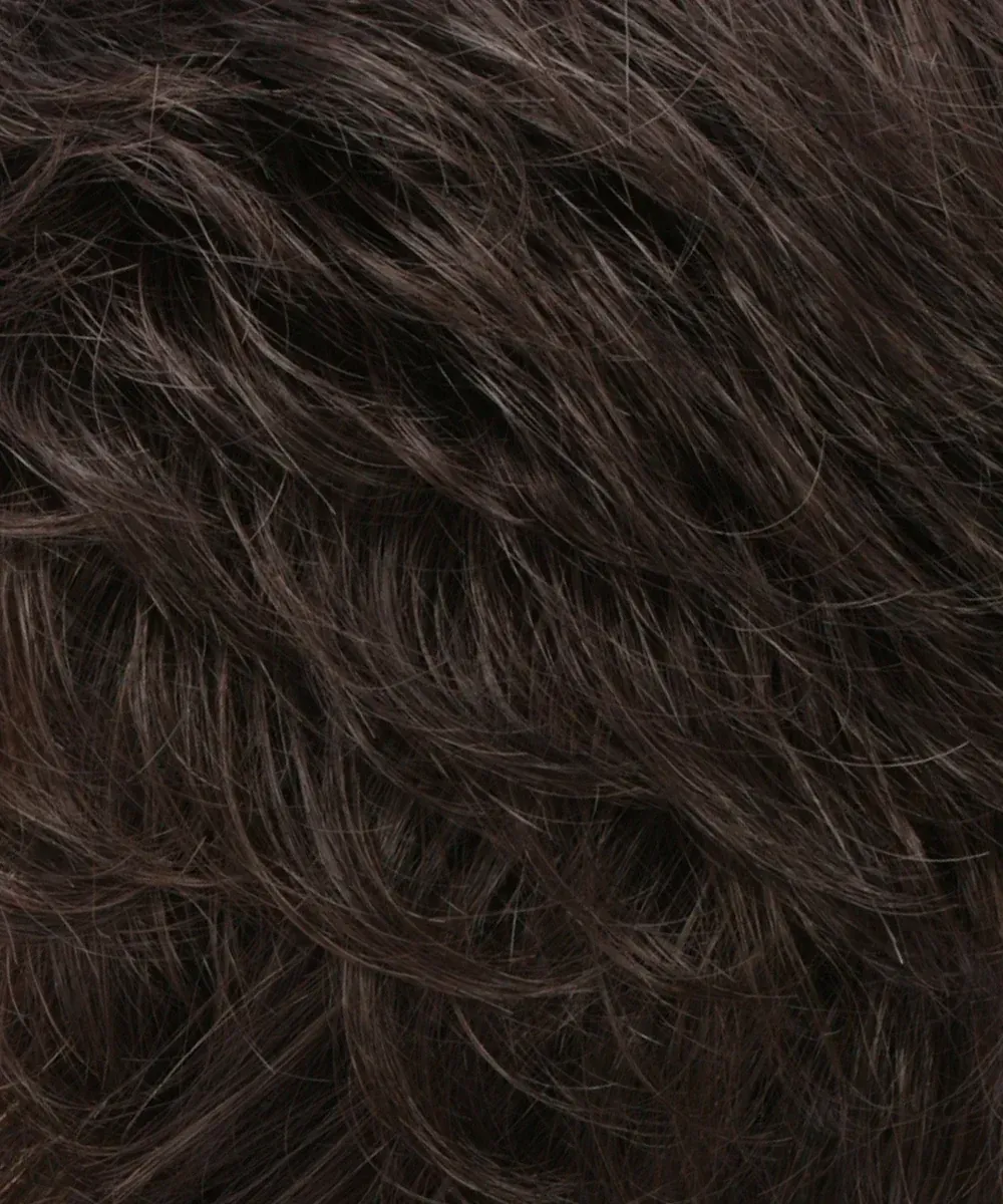 A close up of a piece of brown hair.