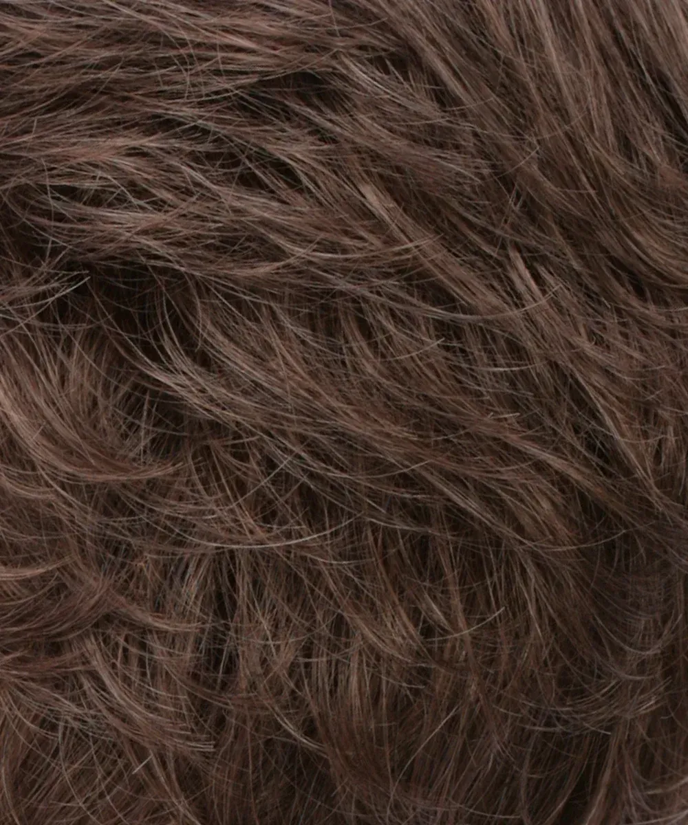 A close up of a piece of brown hair.