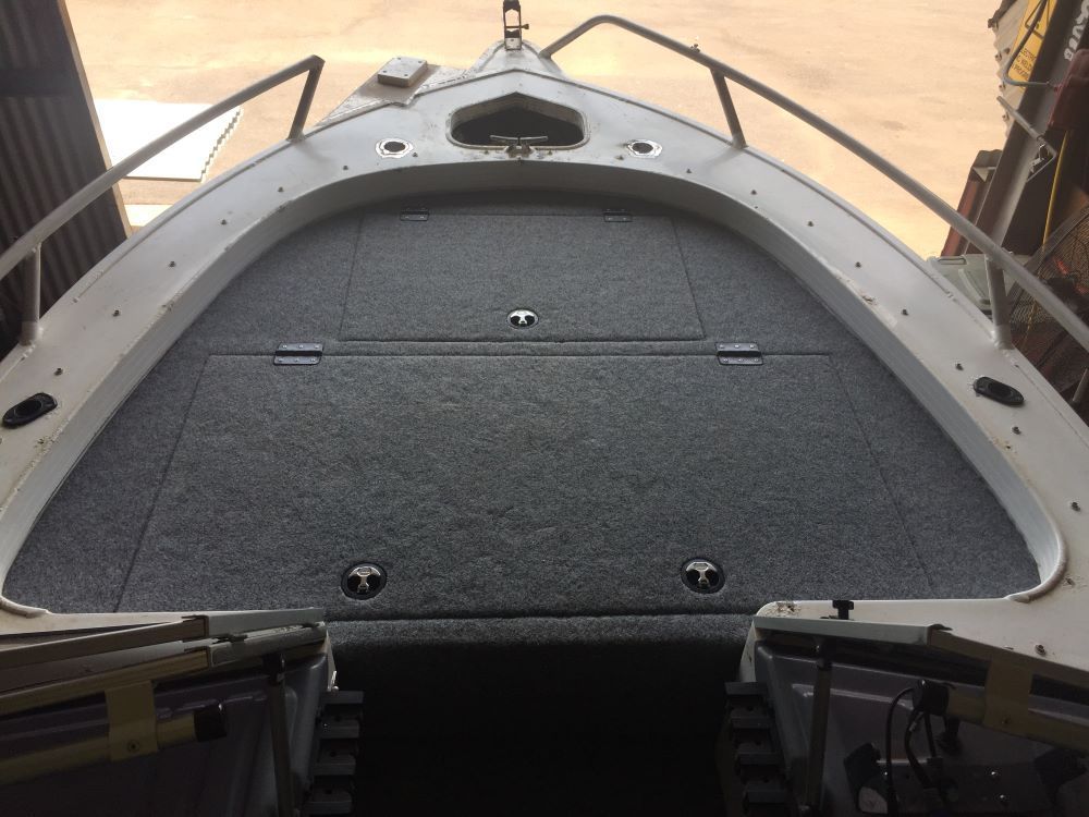The Front of a Boat With a Gray Carpeted Deck — Allycraft Modifications in Berrimah, NT