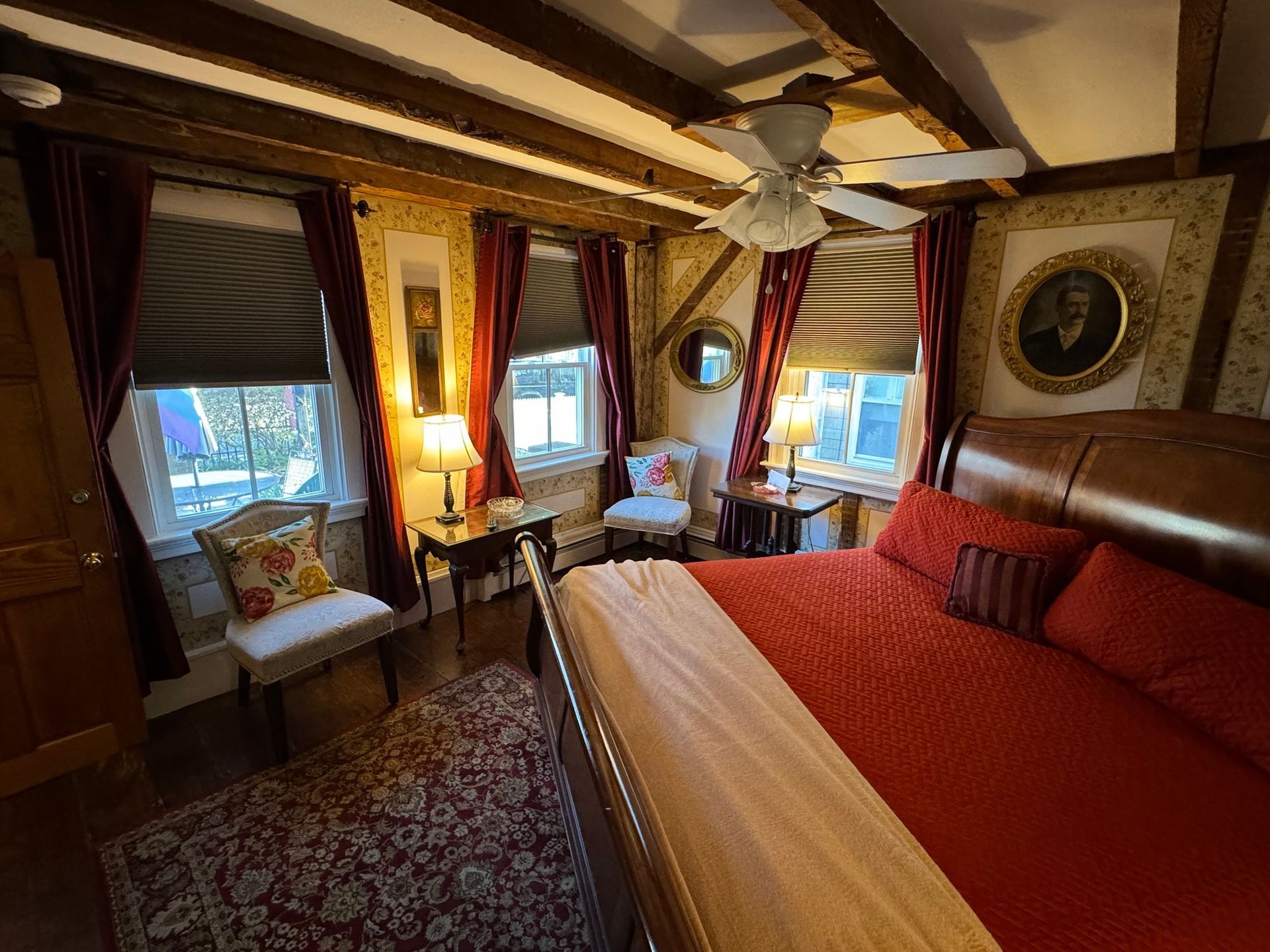 A sunset over a mountain range with a lot of fog