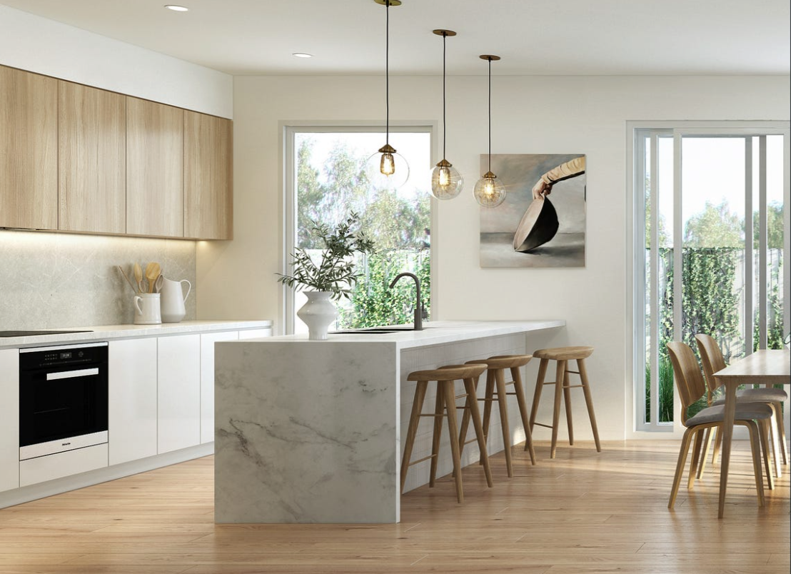 Modern Kitchen With Marble Island, Wooden Cabinets, and Pendant Lights — Kolora Projects in Robina, QLD