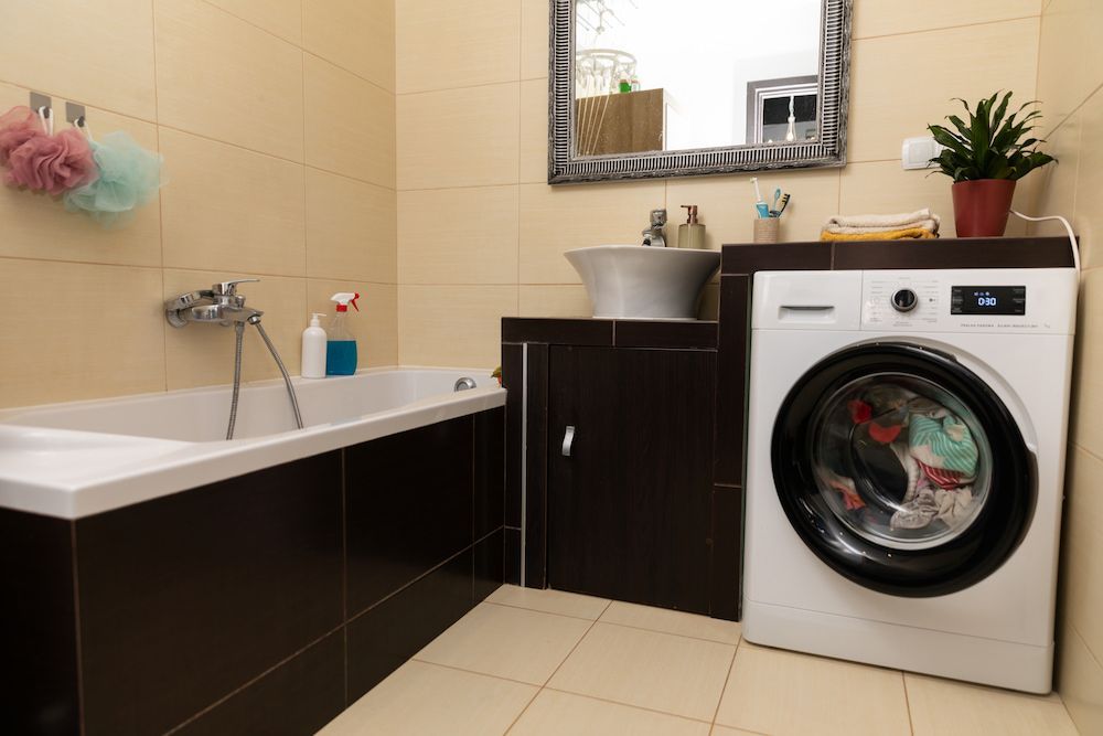 Bathroom With Brown and Beige Tiles — Kolora Projects in Tweed Heads, NSW