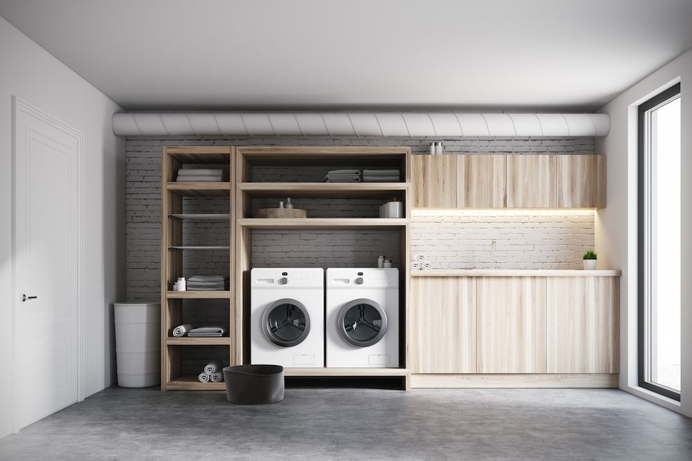 Laundry Room With Wooden Cabinets — Kolora Projects in Robina, QLD