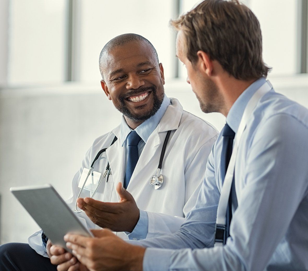 Person Talking to Doctor — Fort Walton Beach, FL — Waldorff Insurance & Bonding