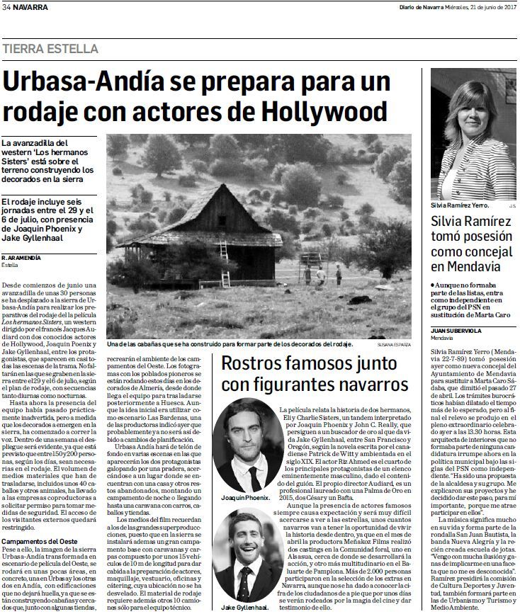 Un artículo de periódico con una foto de una casa en la portada.