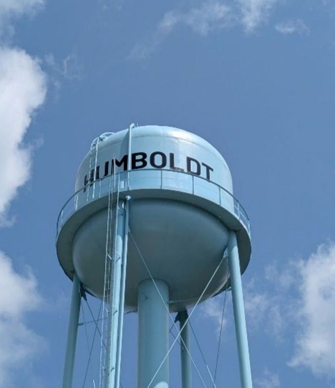 A blue water tower with humboldt written on it