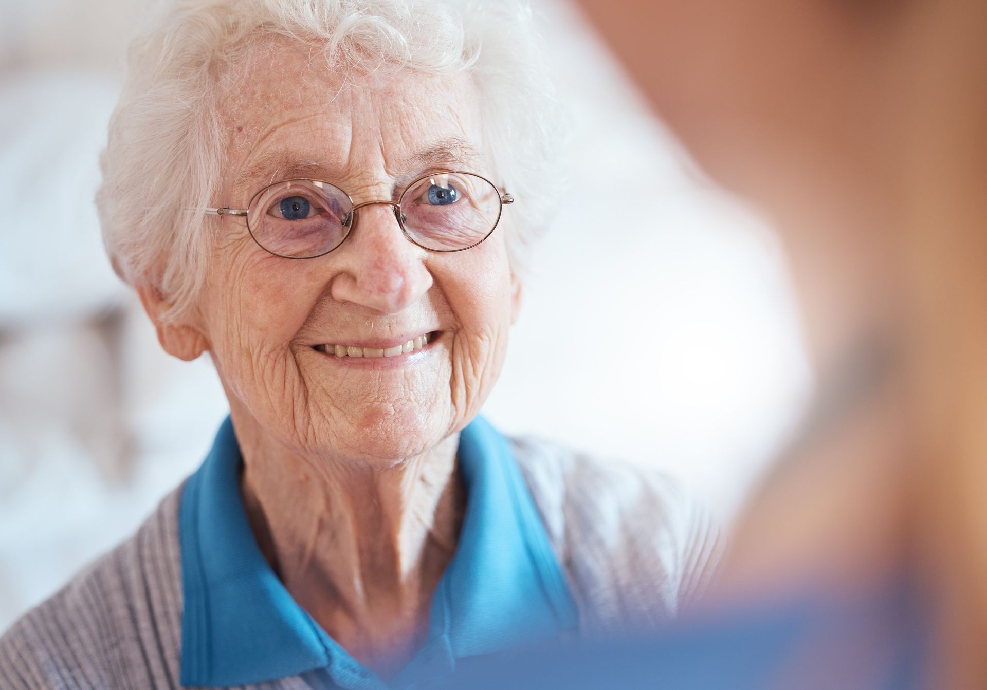 a happy senior woman with glasses