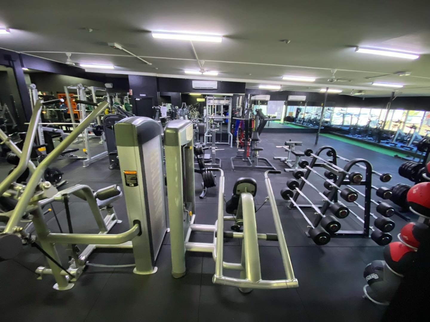 A Gym Filled With Lots Of Exercise Equipment And Dumbbells — 360 Fitness Group in Gordonvale, QLD