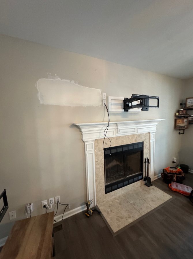 After running the wires and repairing the wall. Before painting.