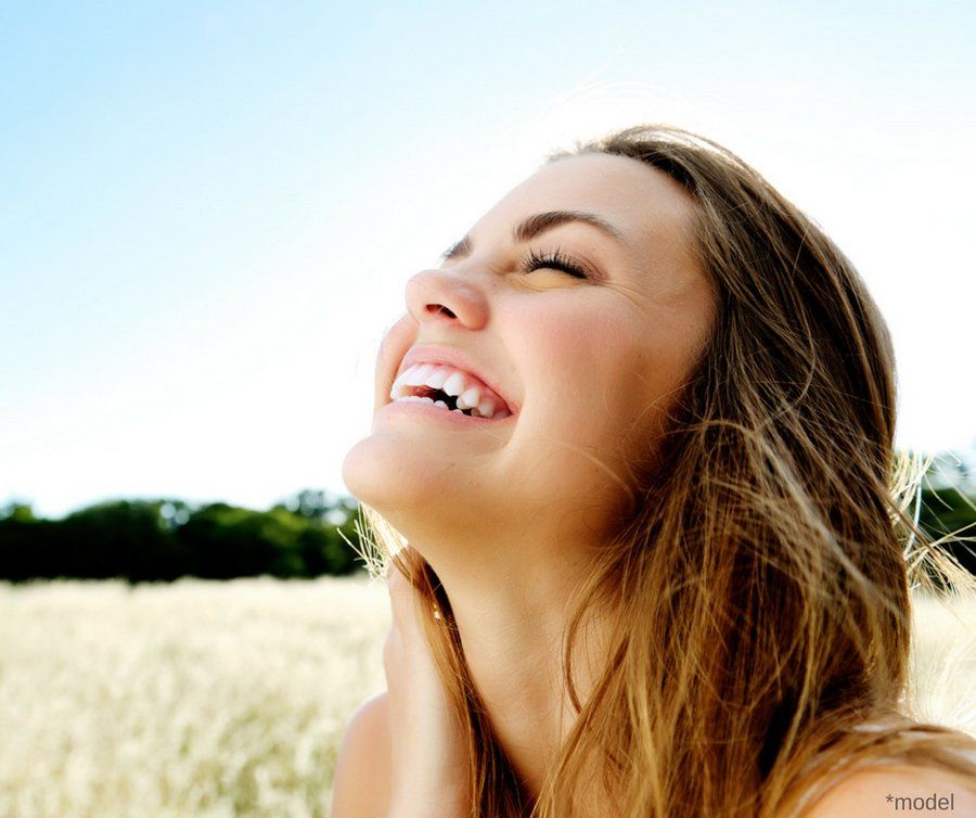 Dental Implants — Woman Smiling in Washington, DC