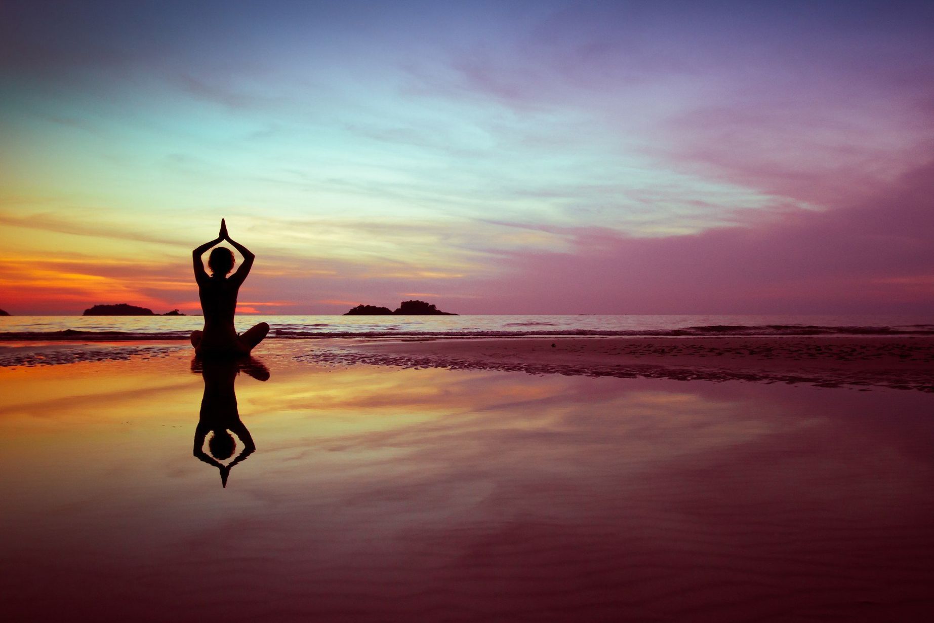 Yoga sulla spiaggia