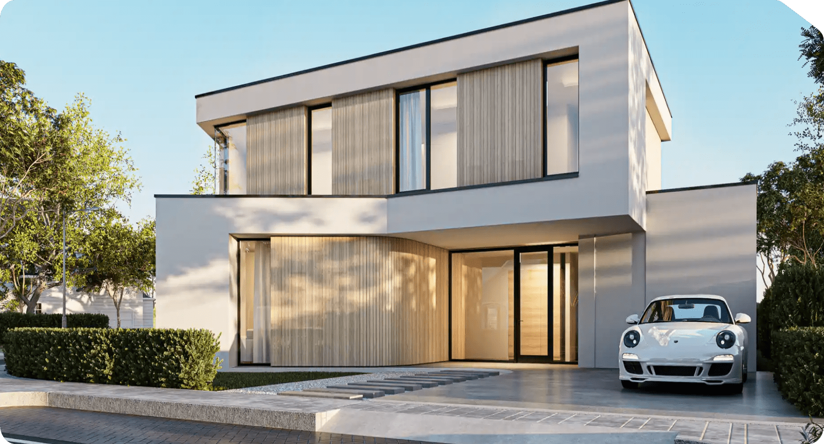 A white car is parked in front of a modern house.