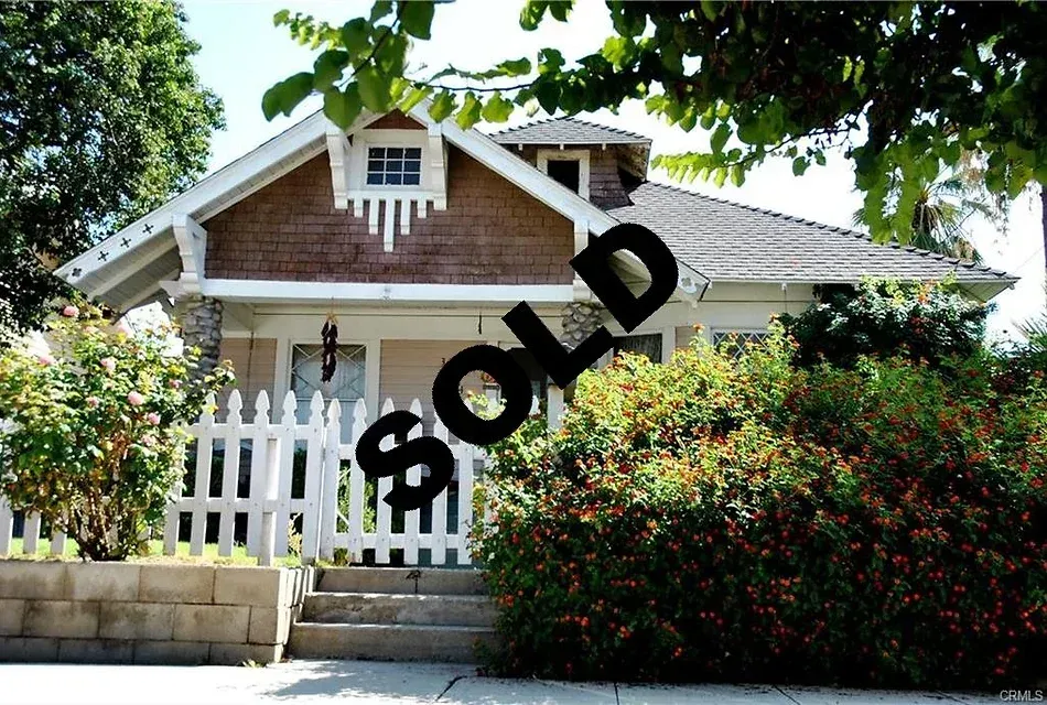 A picture of a house that has been sold