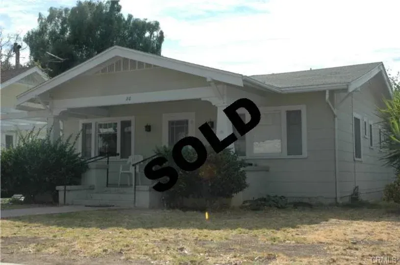 A picture of a house that has been sold