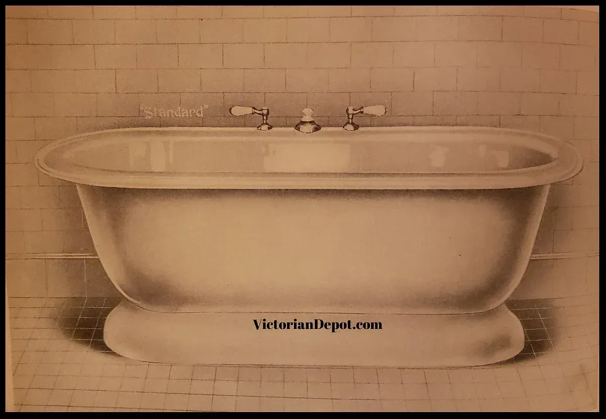 A bathtub with the website victoriandepot.com written on it