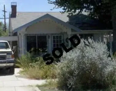 A picture of a house that has been sold