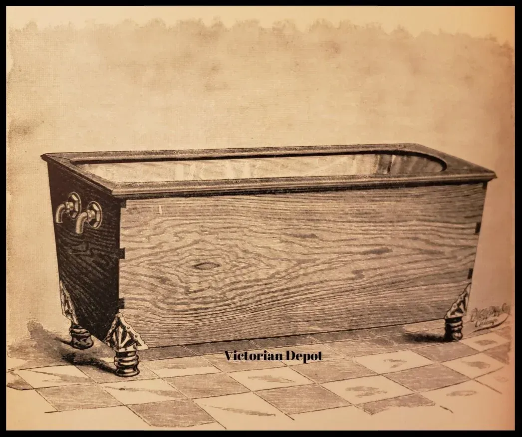 A black and white photo of a wooden bathtub with the words victorian depot below it