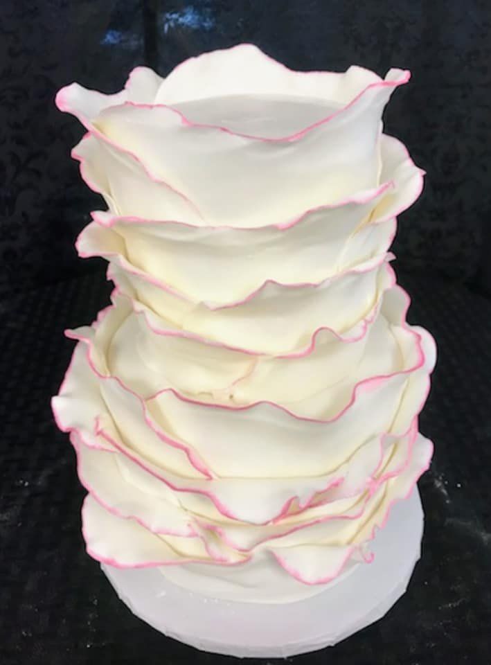 Cake Service — White Icing Design With Flowers Topper In Colorado Springs, CO