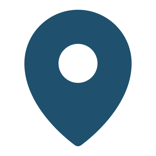 A blue map pin with a white circle in the middle.
