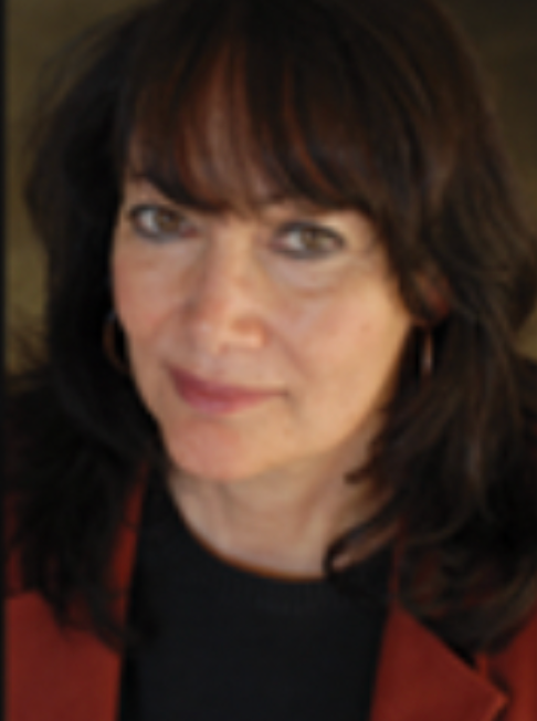A close up of a woman 's face with a red jacket on