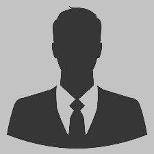 A silhouette of a man in a suit and tie without a face.