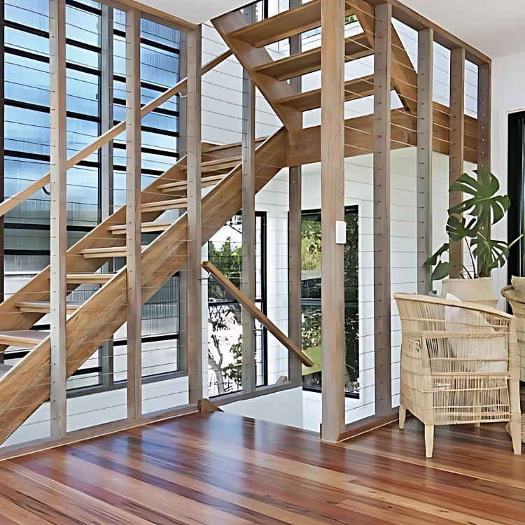 A Kitchen With Wooden Floors and Stairs Leading Up to It  — Tweed Coast Cork & Timber Floors In Pottsville, NSW