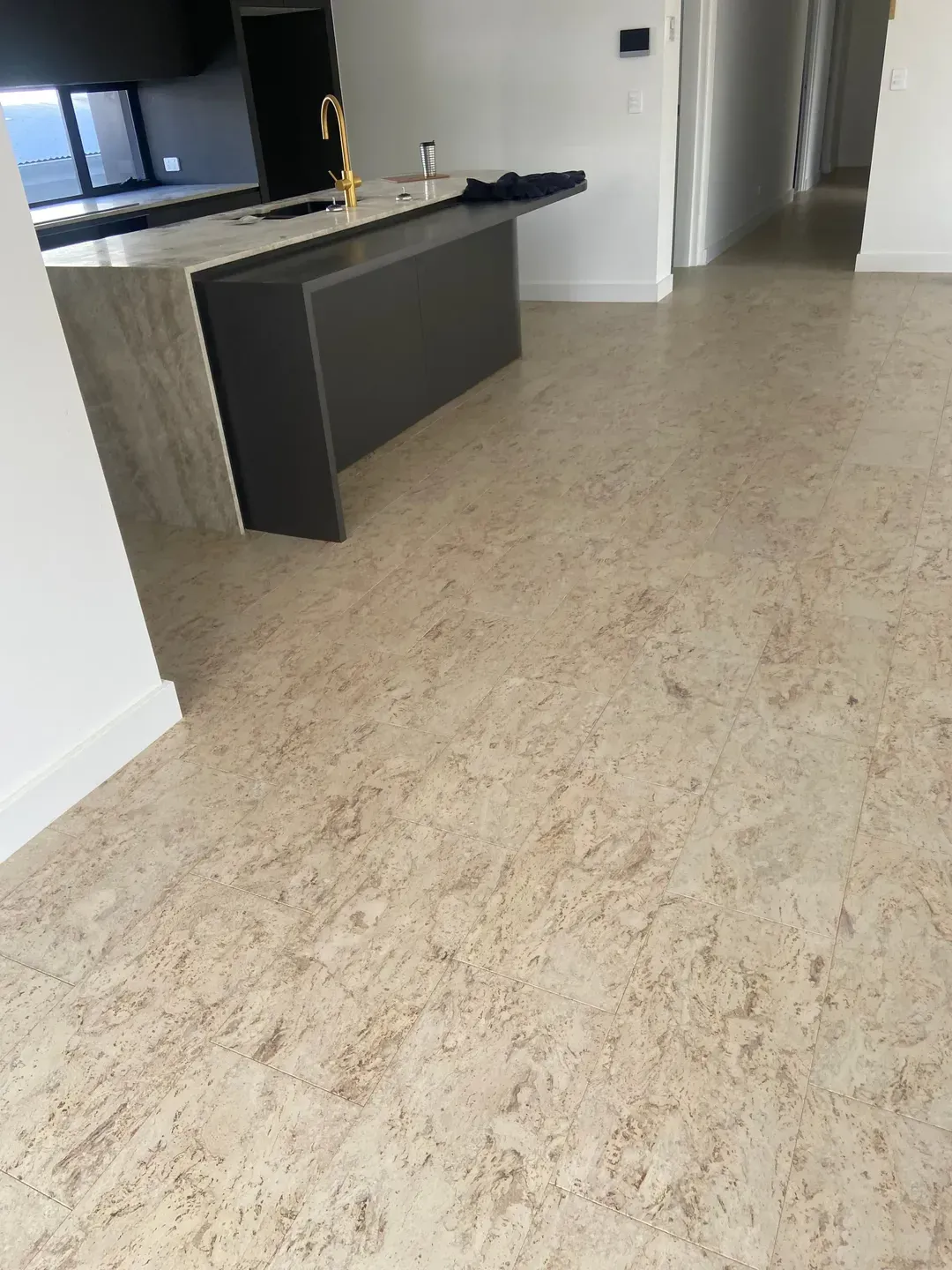 Empty Room With Cork Flooring, White Walls, And Covered Built-in Storage — Tweed Coast Cork & Timber Floors In Byron Bay, NSW
