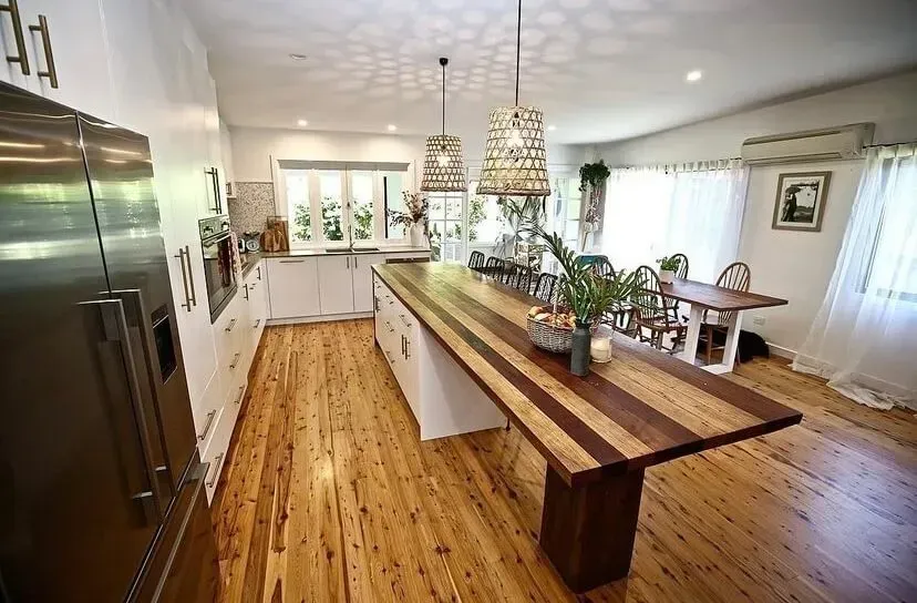 There is a Long Wooden Table in the Middle of the Kitchen — Tweed Coast Cork & Timber Floors In Tweed Heads, NSW