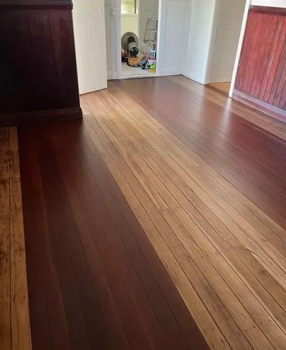 A Wooden Floor With a Striped Pattern in a Room — Tweed Coast Cork & Timber Floors In Tweed Heads, NSW