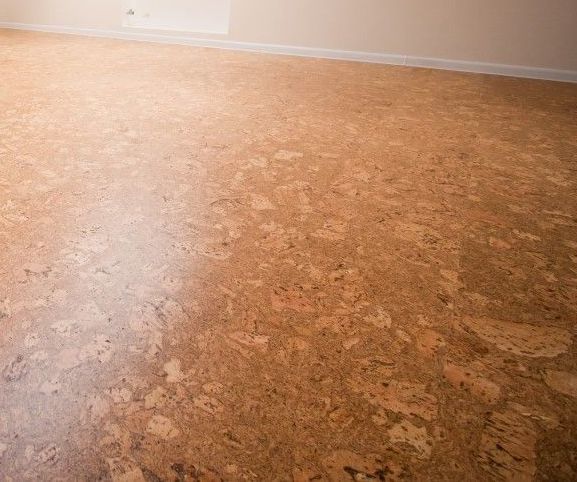 Wooden Desk, A Chair, And Cork Flooring — Tweed Coast Cork & Timber Floors In Tweed Heads, NSW