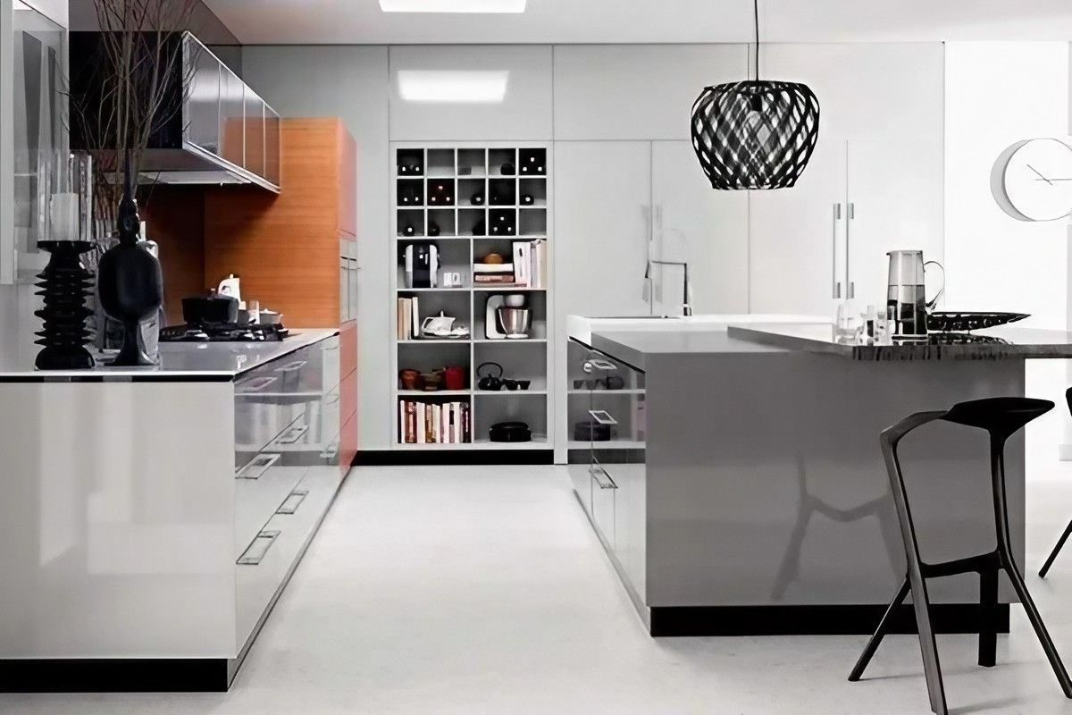 A Kitchen with A Large Island and A Clock on The Wall — Bestbuy Kitchens in Yandina, QLD