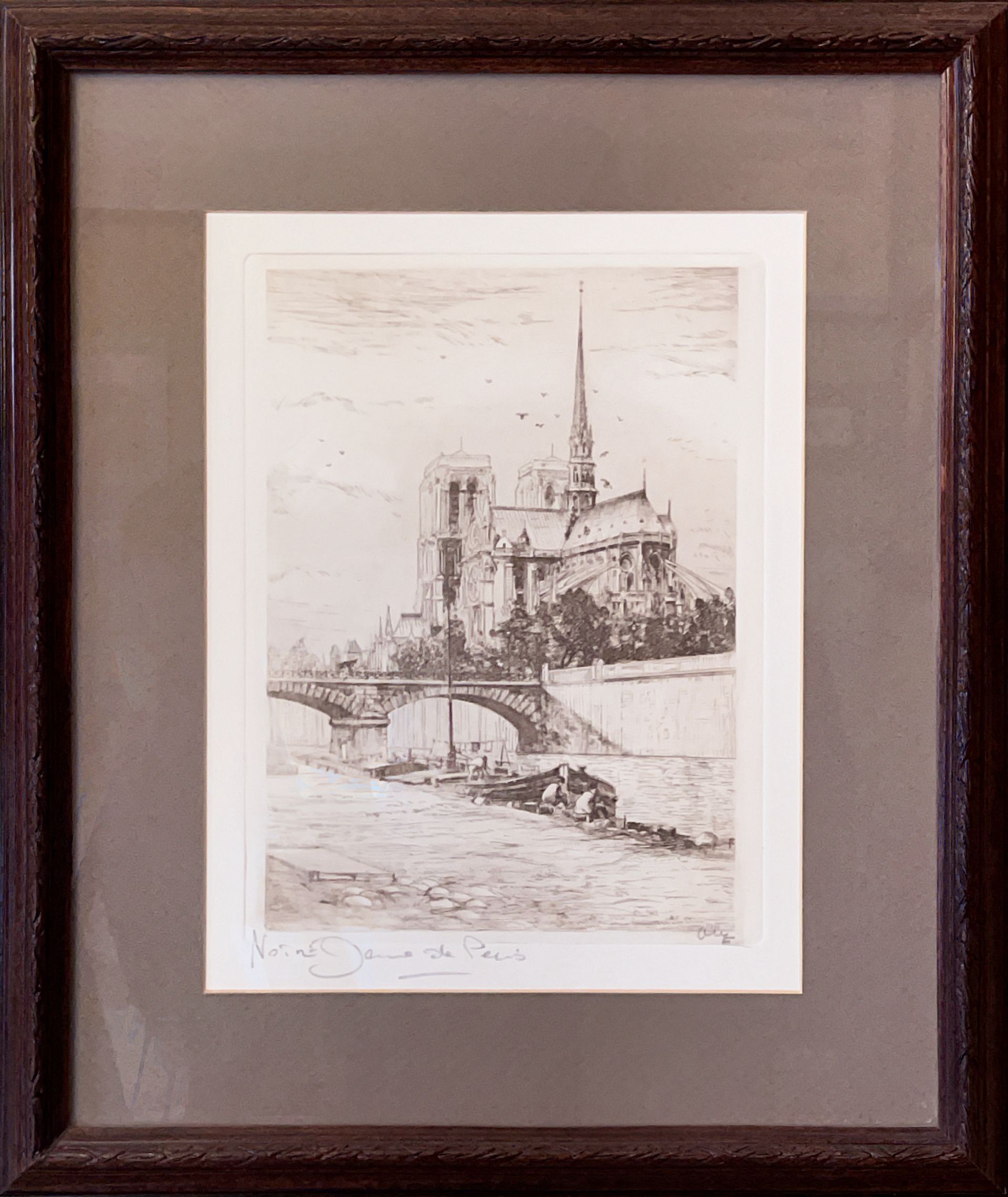 A black and white drawing of a cathedral in a wooden frame