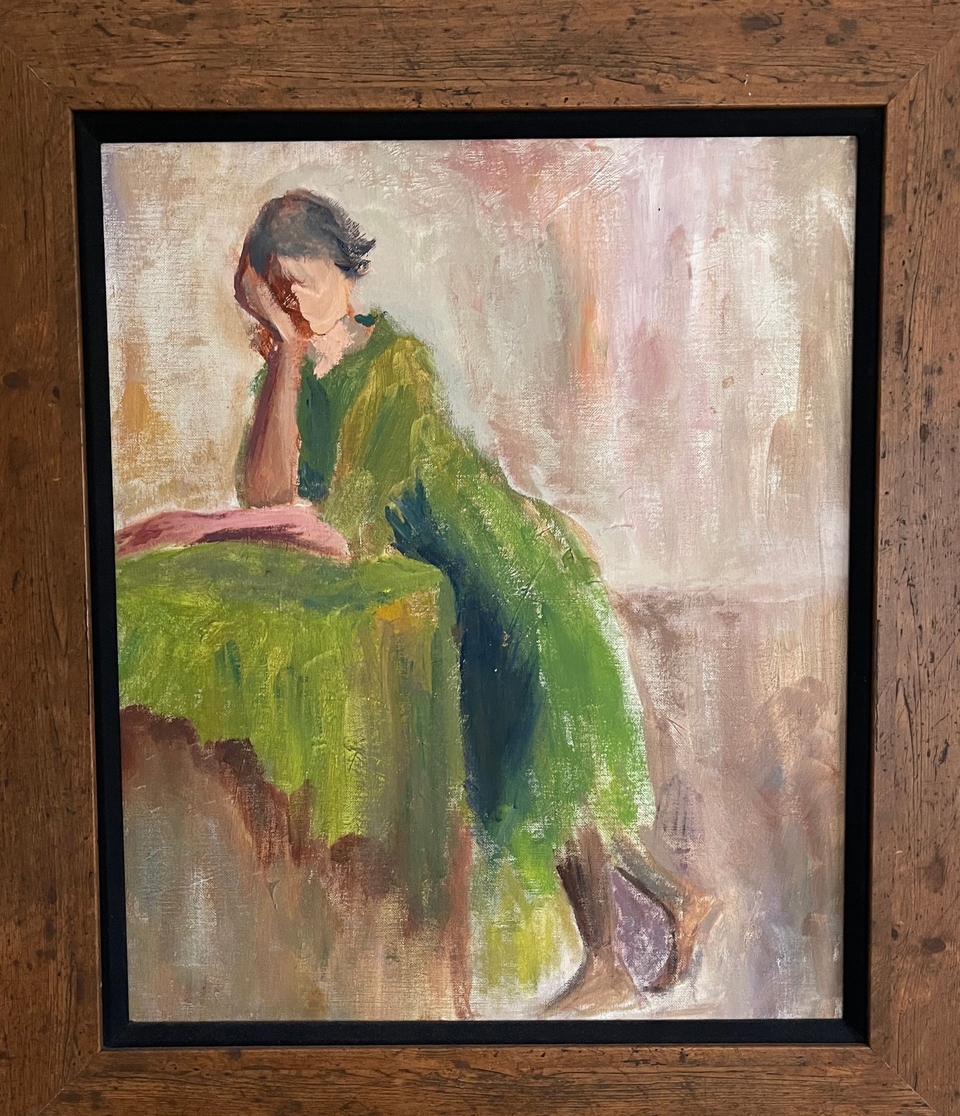 A framed painting of a woman in a green dress