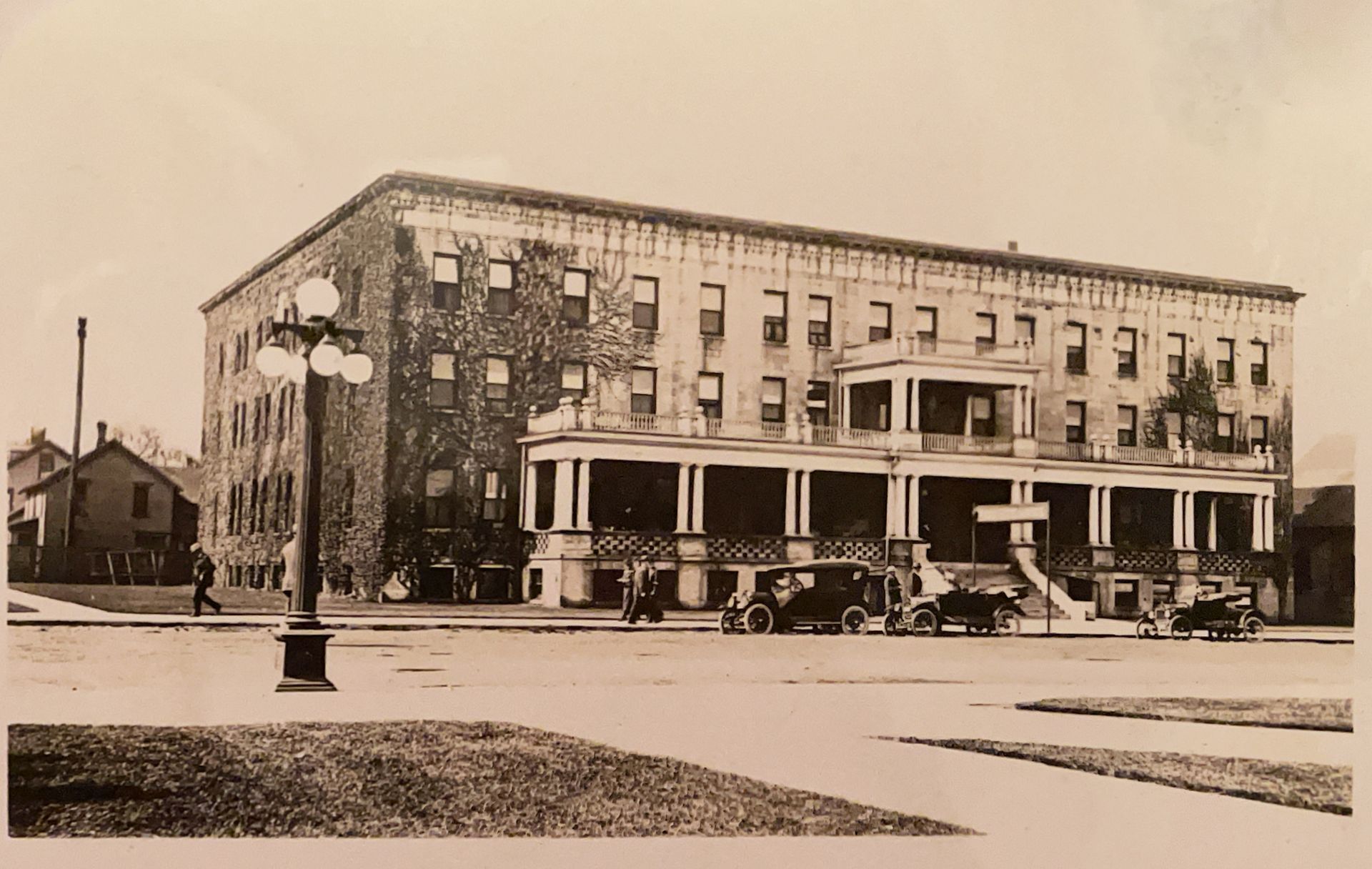 A black and white photo of a large building