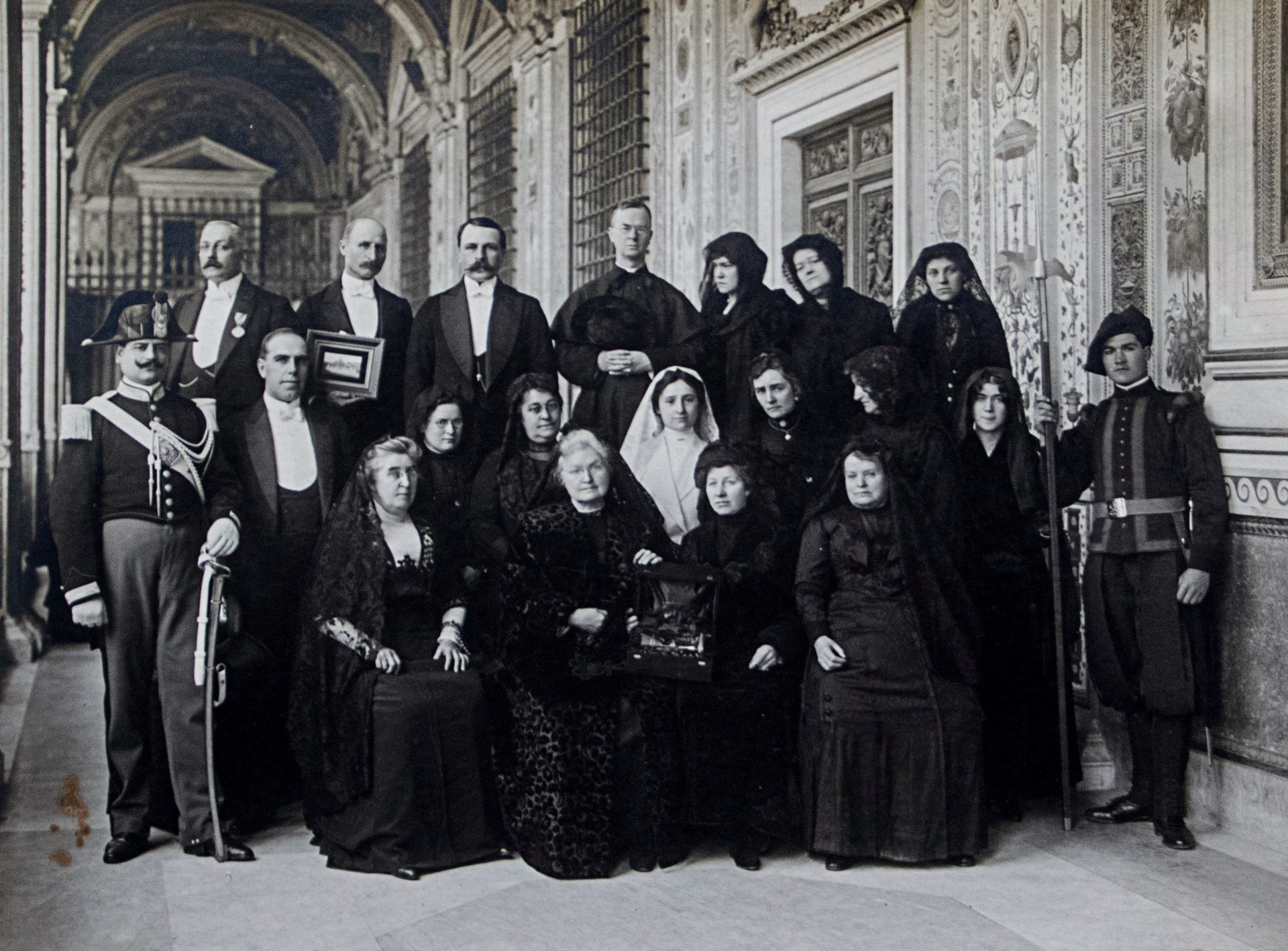 A black and white photo of a group of people