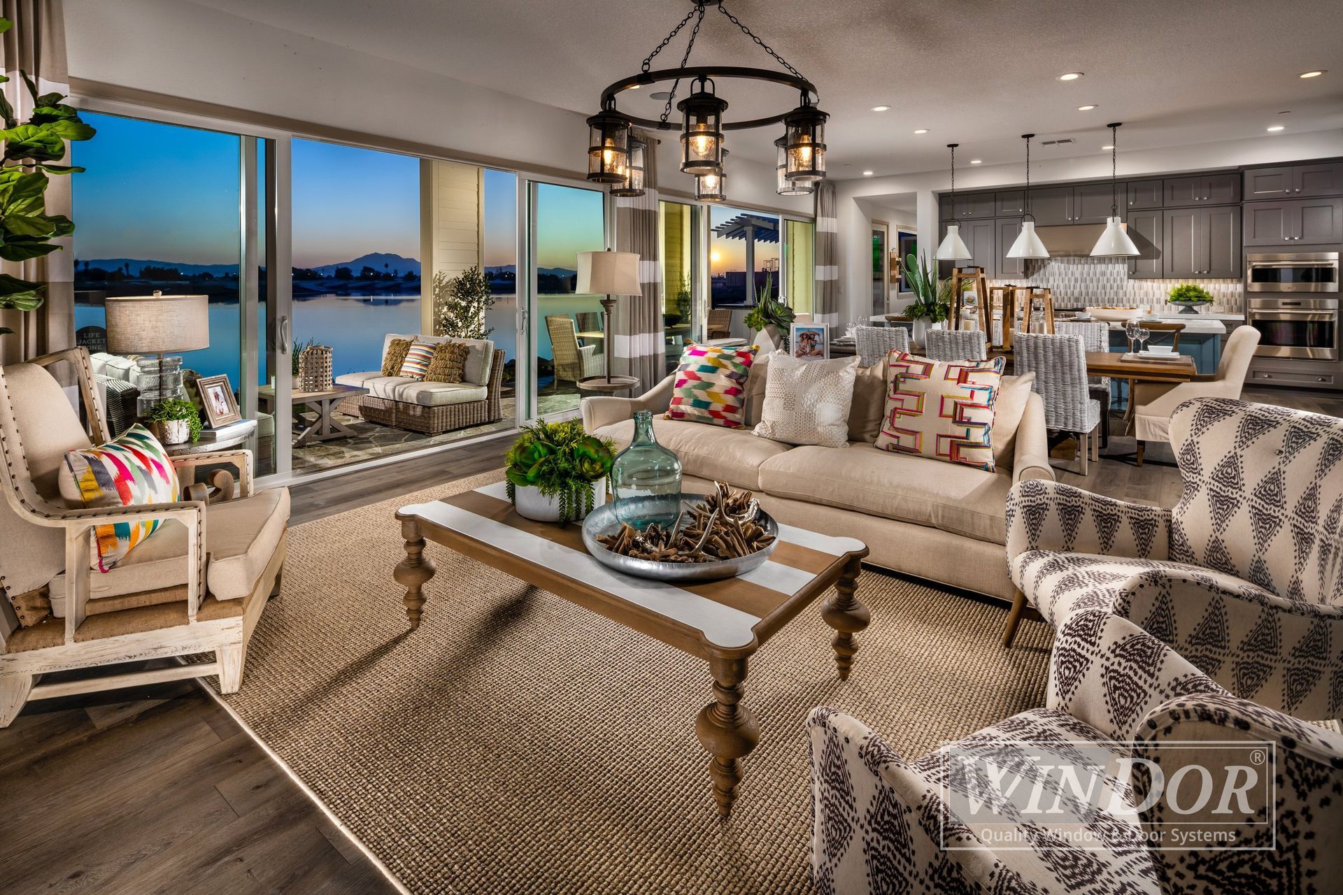 A living room with a couch , chairs and a coffee table
