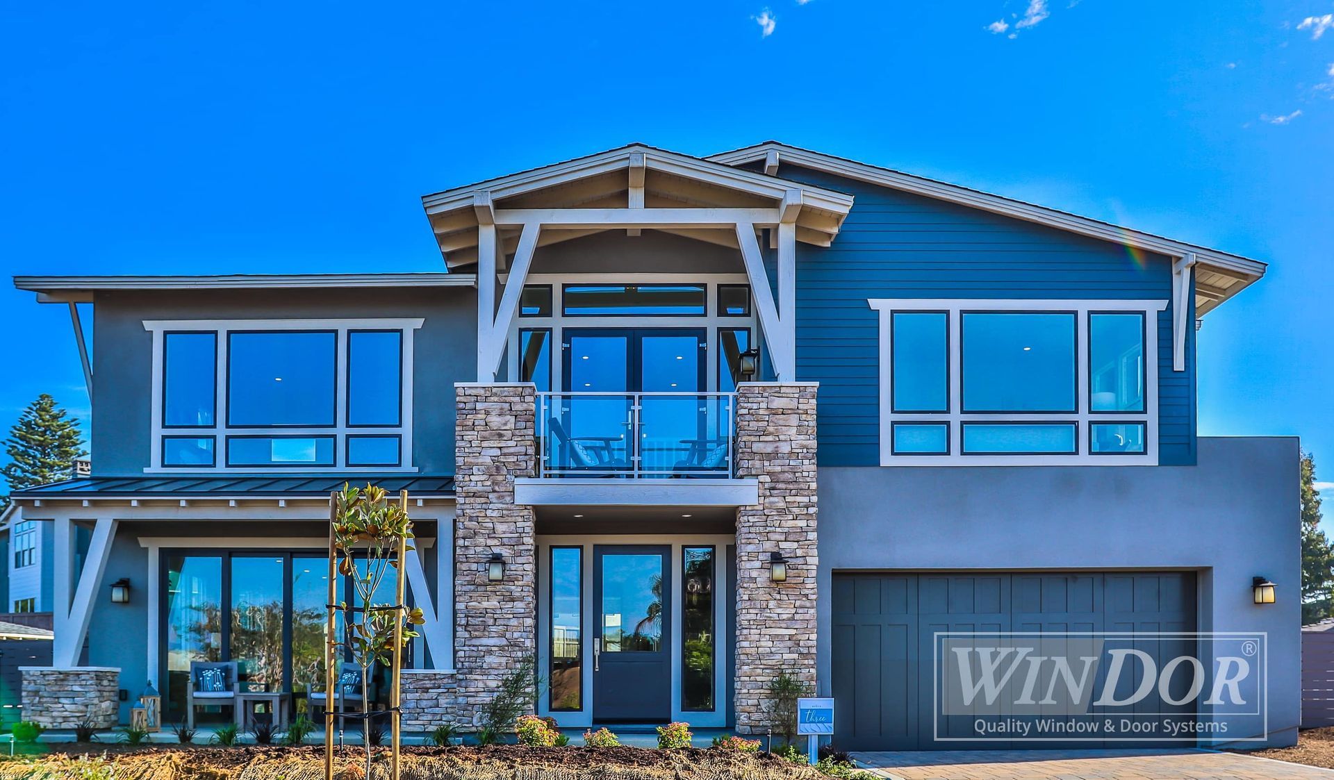 A large house with a sign that says windor on it