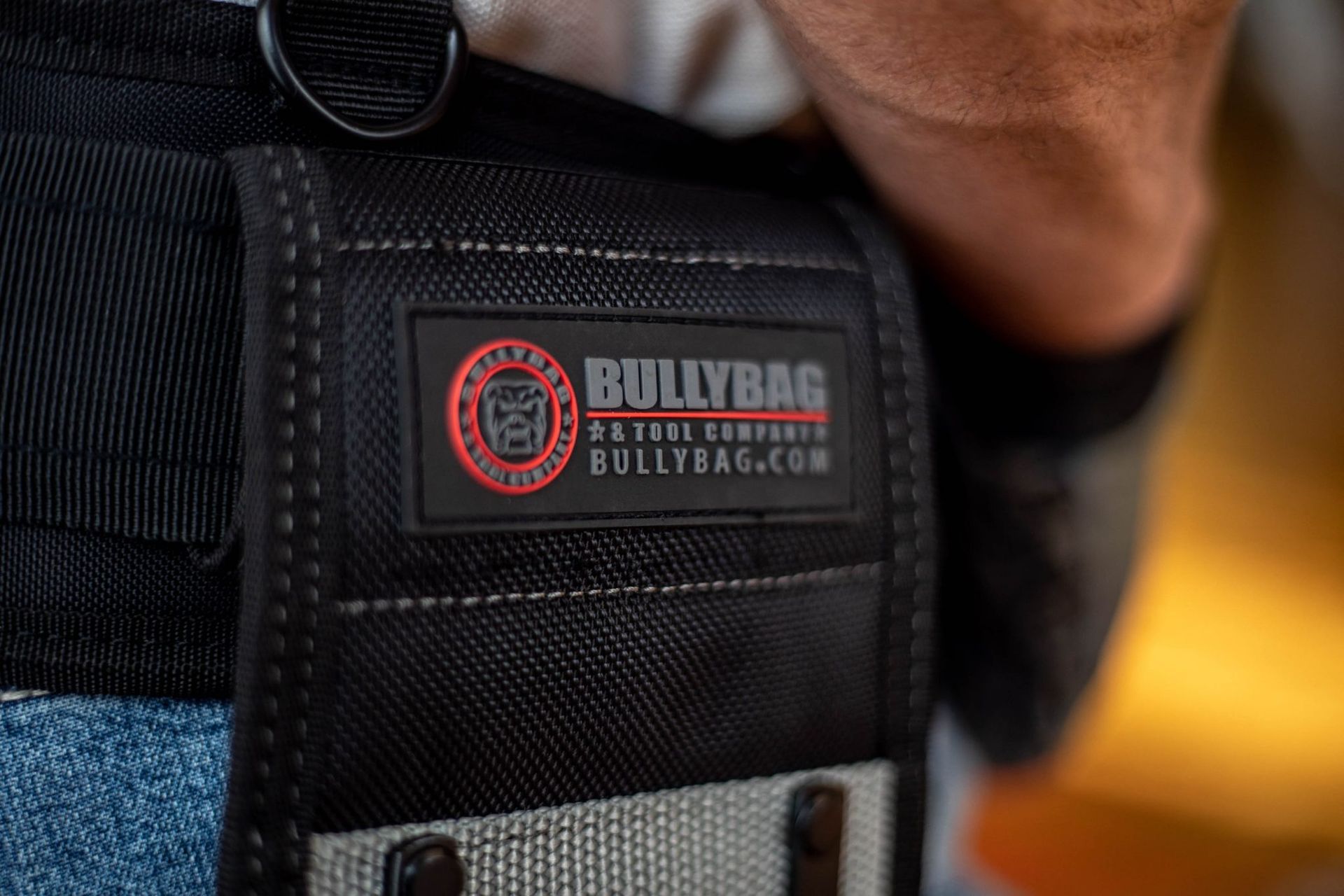 Close-up of a black tool belt pocket with the 