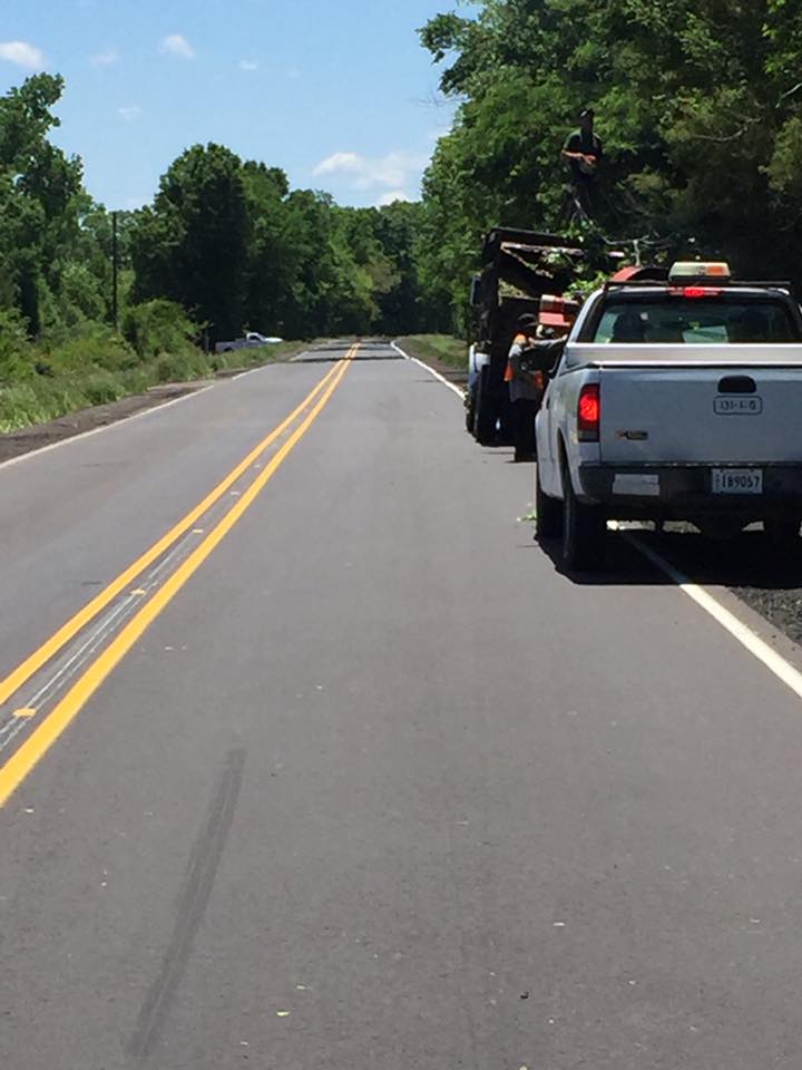 Tree Service Truck Beside The Highway — Monroe, LA — Munholland Tree Service