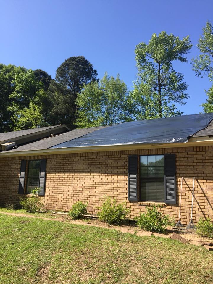 Residential Roof With Cover — Monroe, LA — Munholland Tree Service
