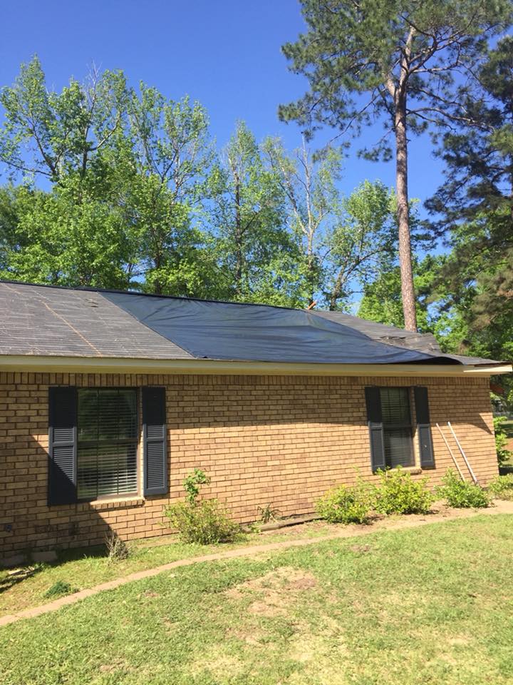 Damged House Roof — Monroe, LA — Munholland Tree Service