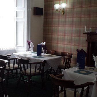 The hotel restaurant in George & Abbotsford Hotel