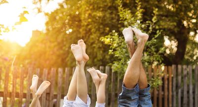 Podiatry — Happy Young Family Showing Legs in Lexington, KY