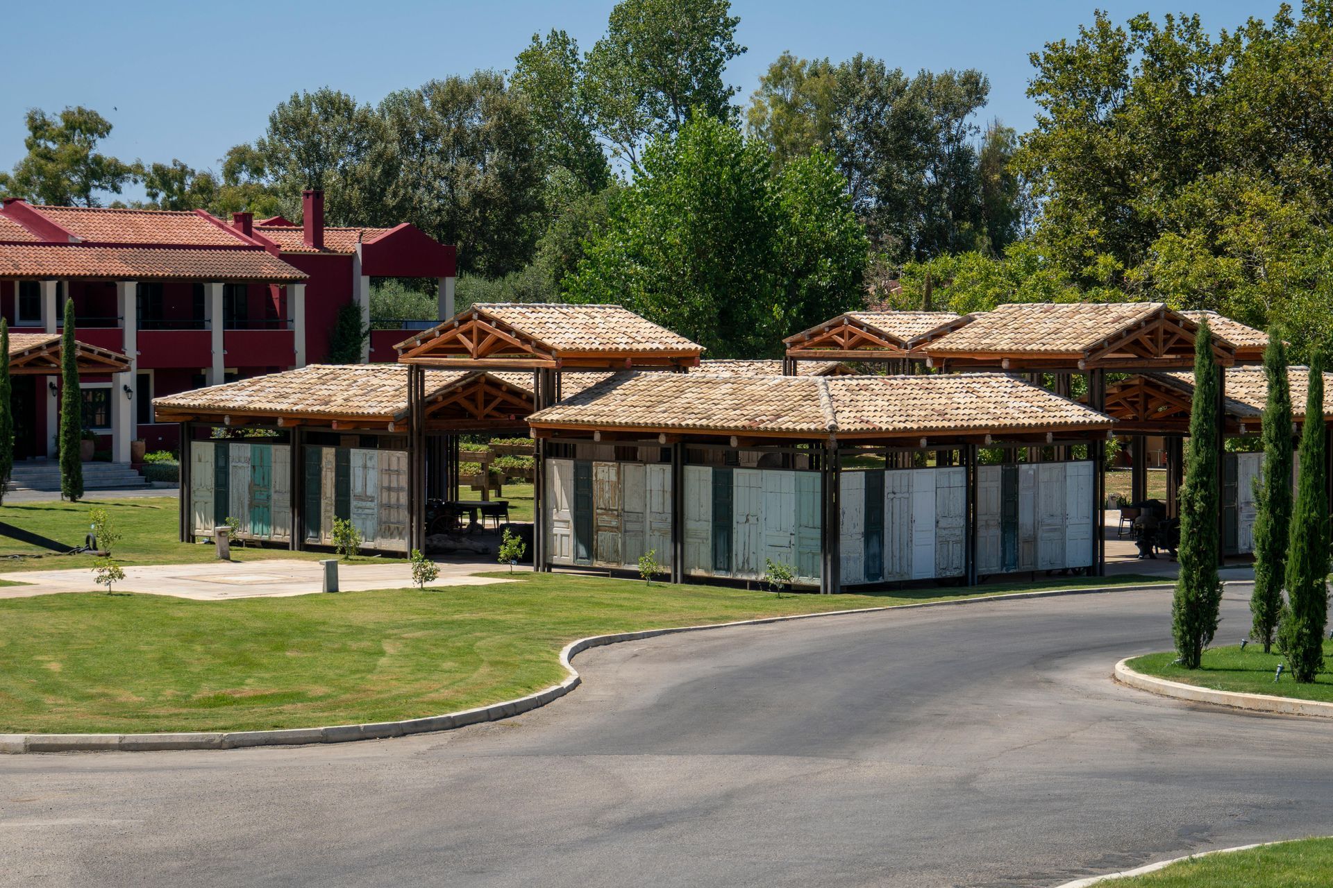 A row of houses with a lot of trees in the background
