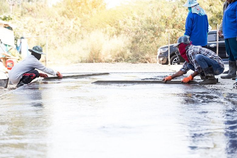 construction worker finishing the cement