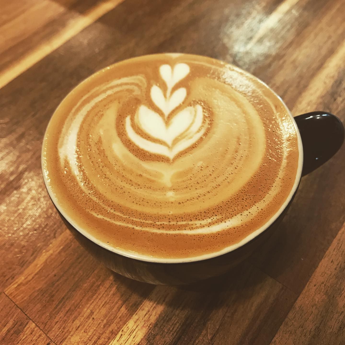 Latte With Intricate Heart-shaped Art — Drop In Espresso Bar in Wallsend, NSW