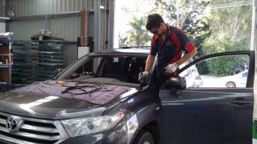 Mechanic Repairing Car — Advanced Windscreens & Service Centre in Proserpine, Qld