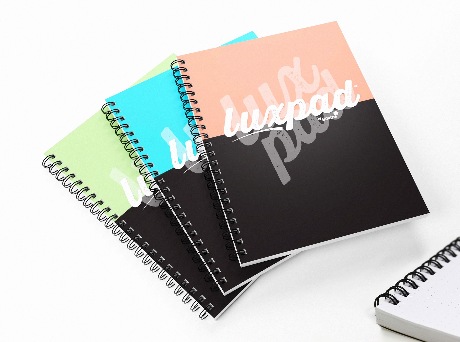 Luxpad dotted notebooks on white background