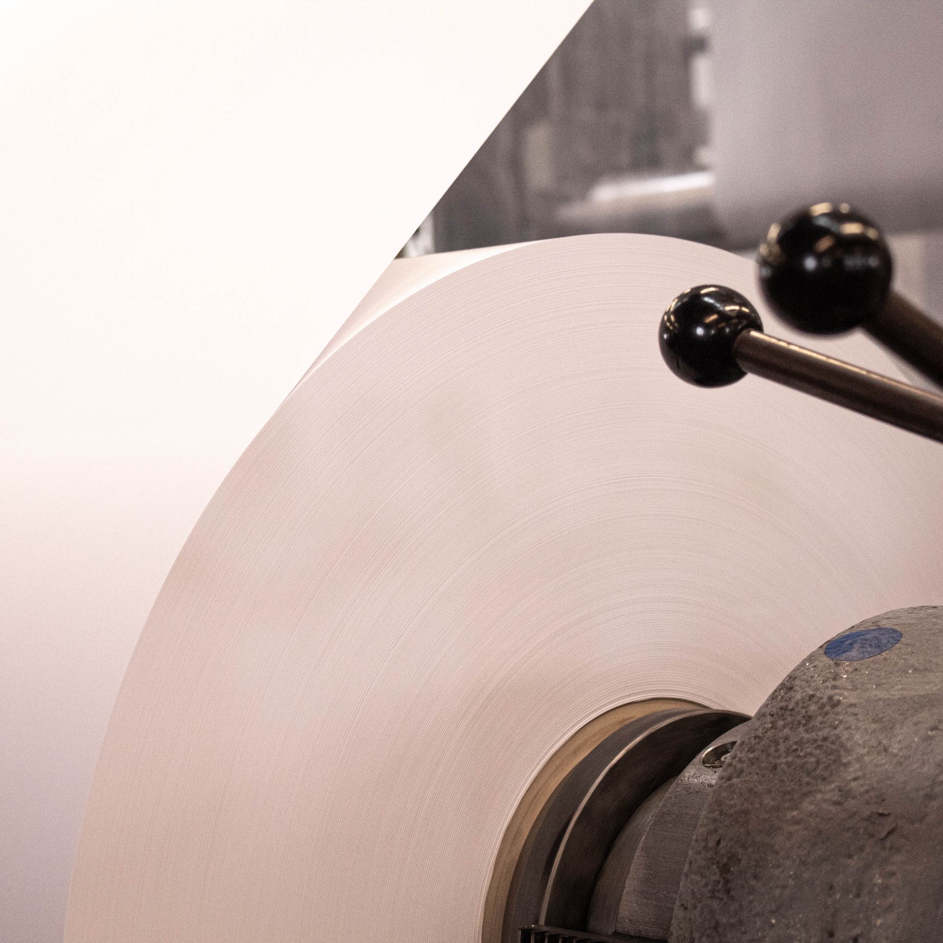 A paper reel on a machine.