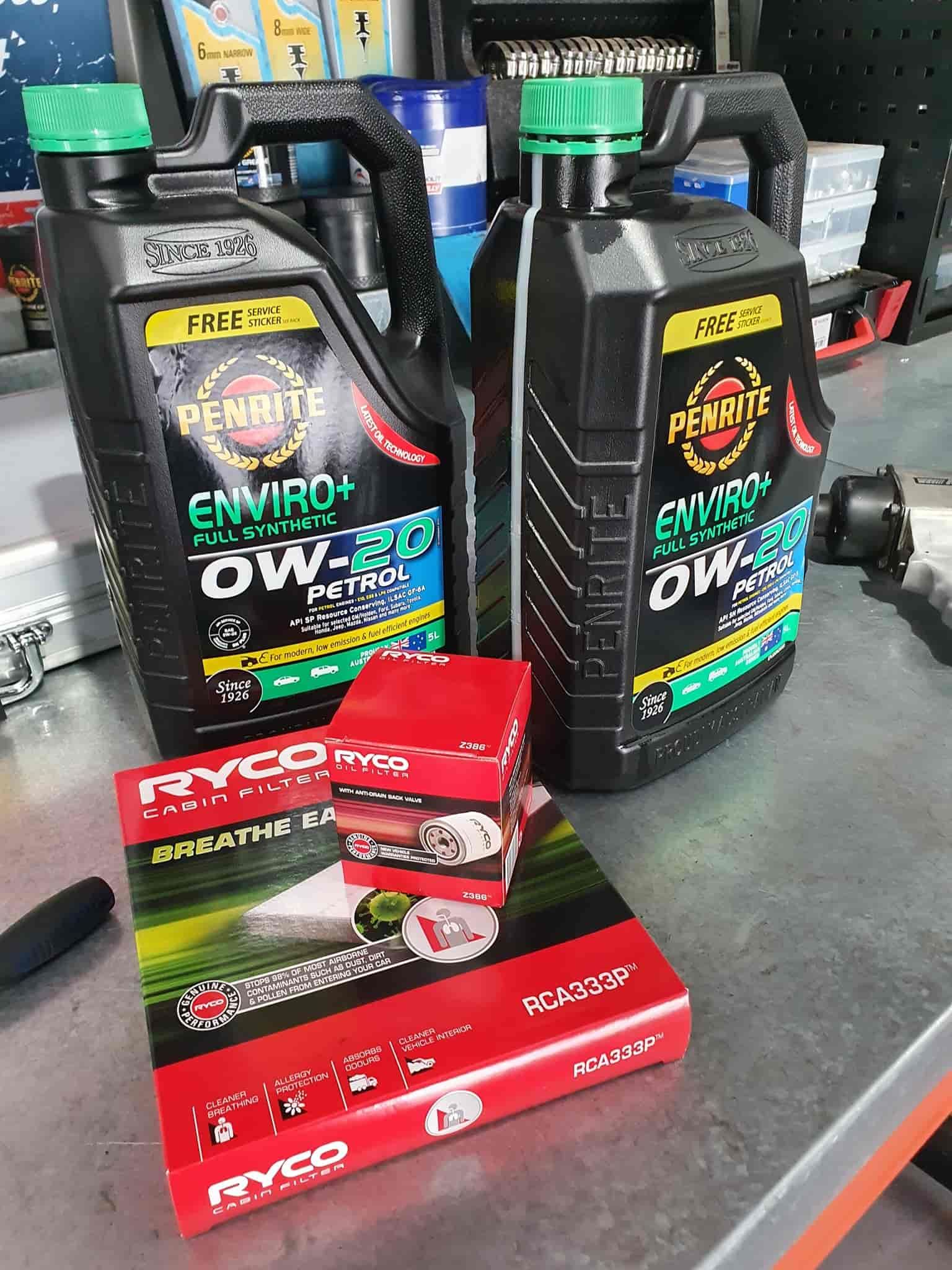 A Couple of Bottles of Oil Are Sitting on Top of a Table — OSP Automotive & Marine In Grafton, NSW